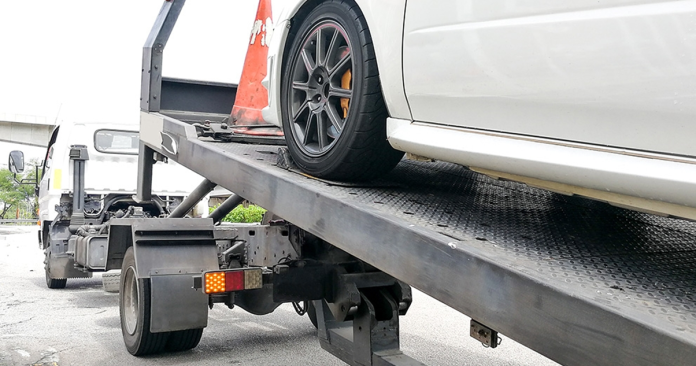 Ottawa towing companies facing allegations under the Towing and Stowage Safety and Enforcement Act, showing a vehicle in tow.