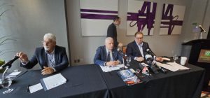 Marc Cadieux, Réjean Breton and Jean Chartrand speaking at a joint press conference in Montreal about the impacts of Driver Inc. on Quebec's trucking industry.